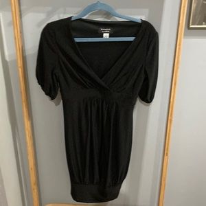 Black mini dress with bubble hem.